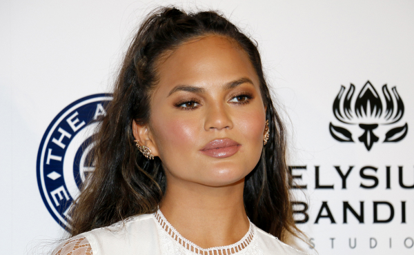 Chrissy Teigen about claim that she lost her tooth in a Fruit Roll-Up at the inauguration ...